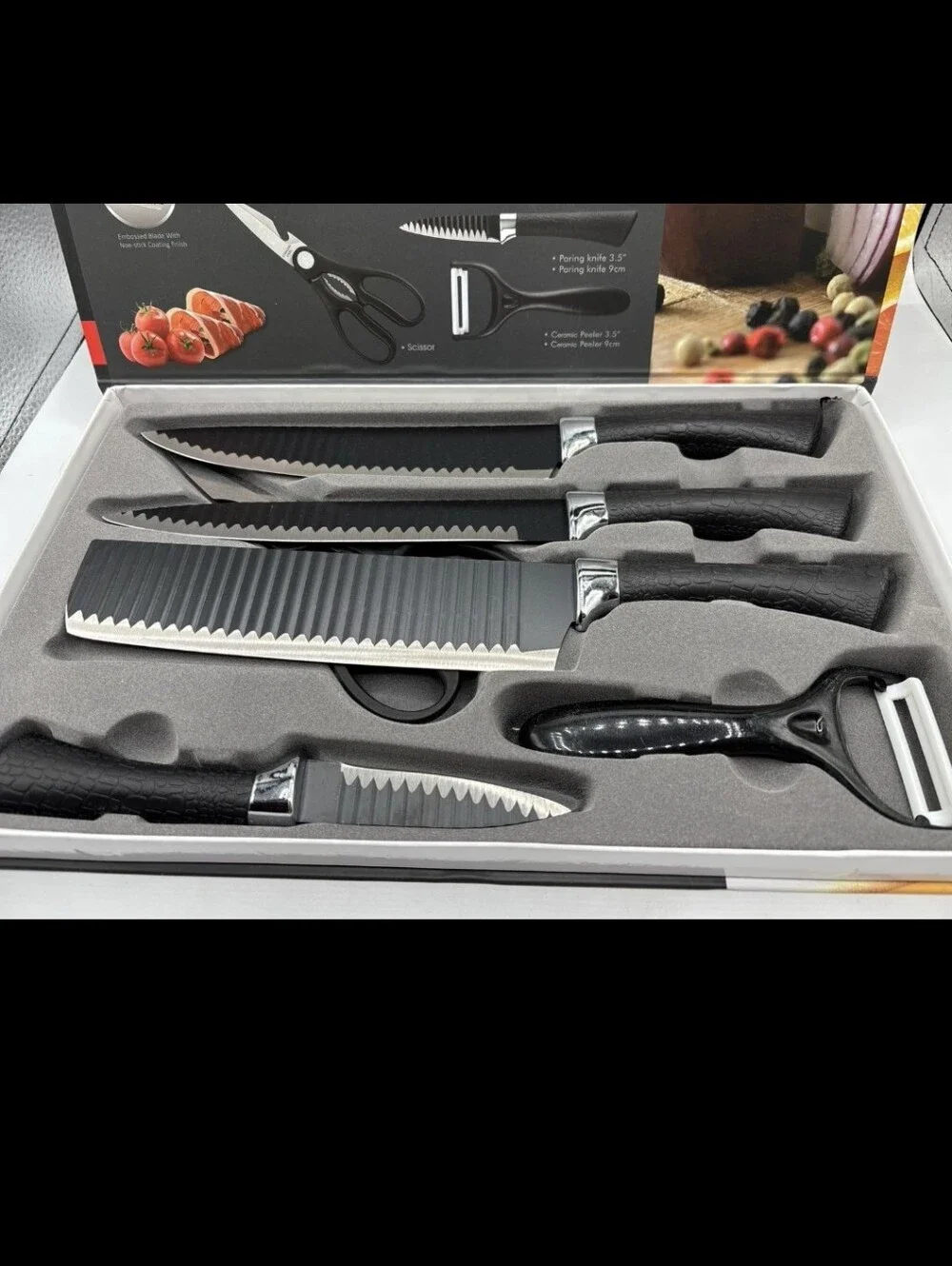 Henvo 6-piece kitchen knife set featuring embossed stainless steel blades New